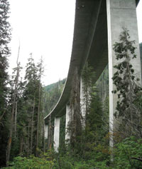 The Interstate 90 freeway stands above Franklin Falls, at left, and towers over the Denny Creek Trail that leads to the waterslides.