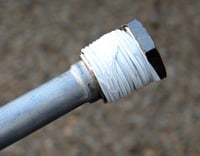 Wrap the threads of the new anode rod with Teflon tape.