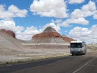 A motorhome travels through Petrified Forest National Park.