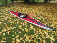 The Folboat Cooper kayak has a metal frame that snaps together. Inflatable air chambers along the sides provide stability.