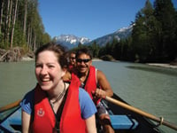 Adventurers take a drift boat eco-tour down the Bella Coola River.