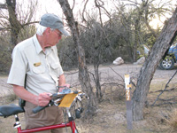 Camp host Dave England checks campsites at Big Bend National Park.