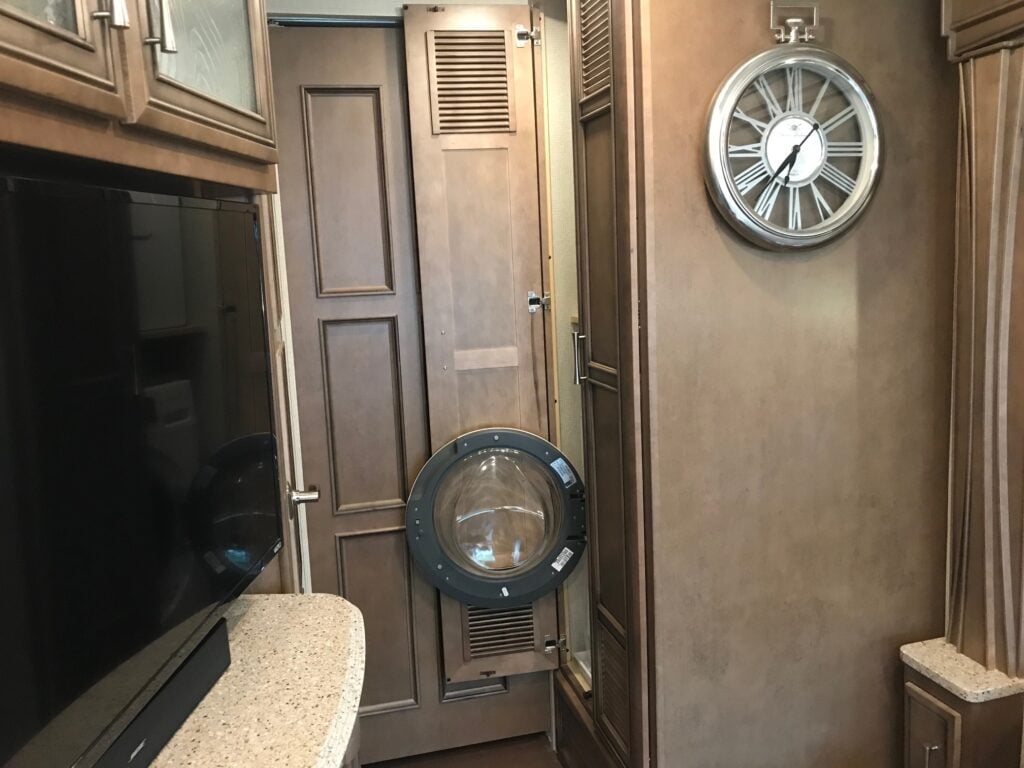 Landry cabinet with washer door open