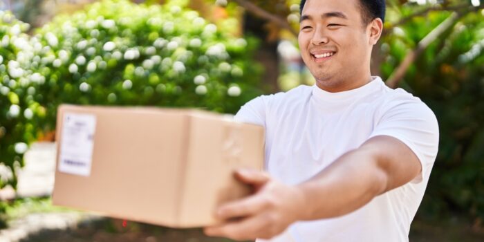 man holding package