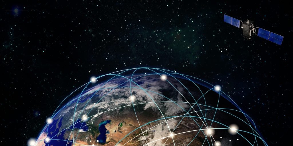 Satellite orbiting earth with connections being made worldwide. Starlink is one of the up and coming RV internet options. 