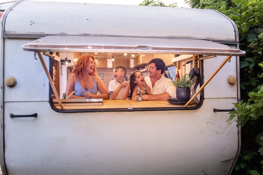 Family enjoying themselves inside the RV they rented 