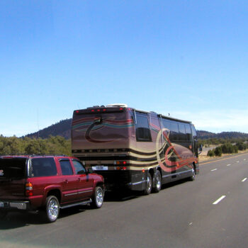 motorhome towing a vehicle using RV tow bars