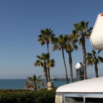 RV travel tips - motorhome and palm trees view