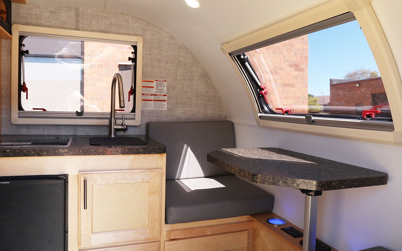 inside kitchen of small lightweight travel trailers
