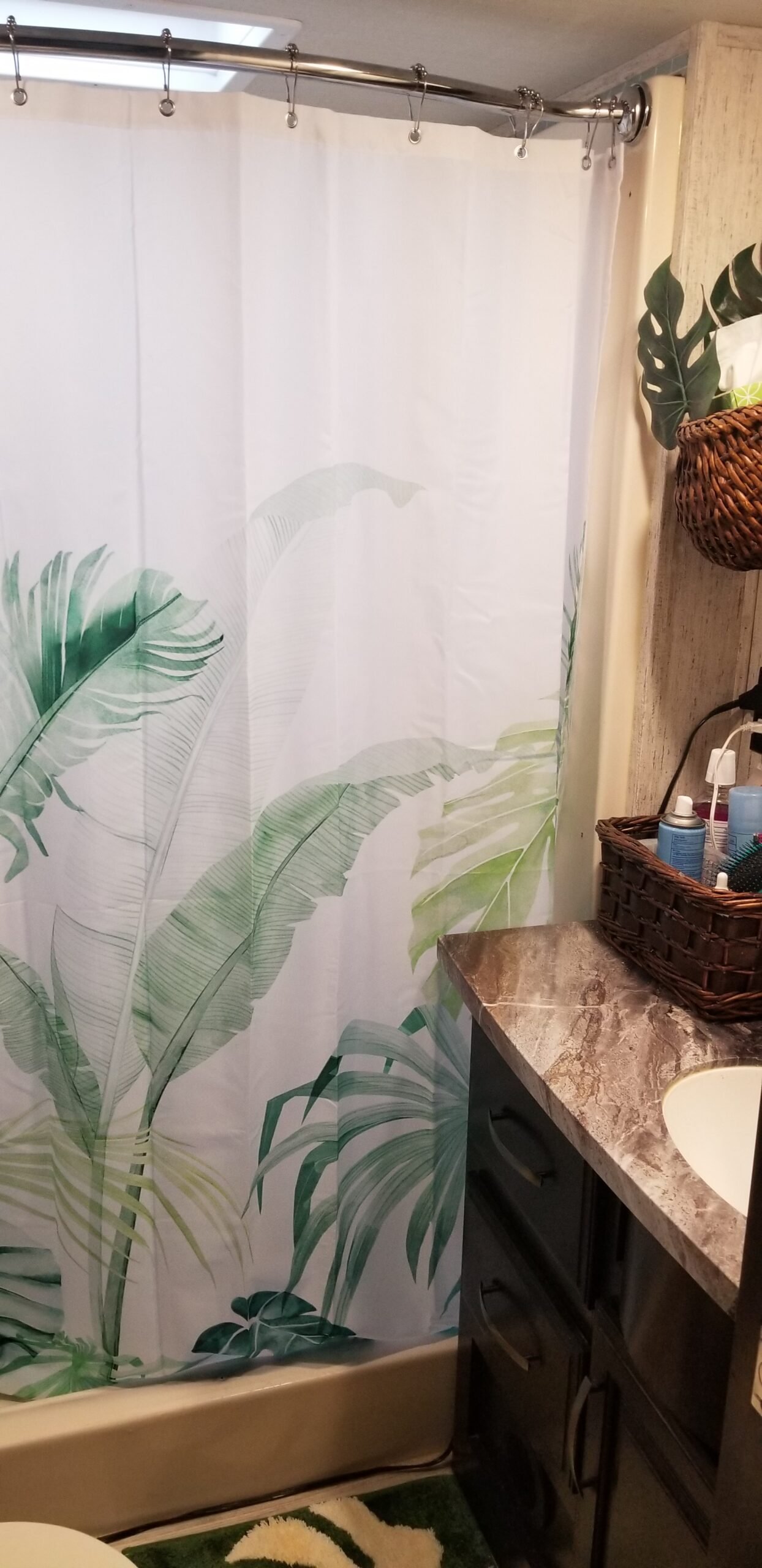New shower curtain and curved shower rod