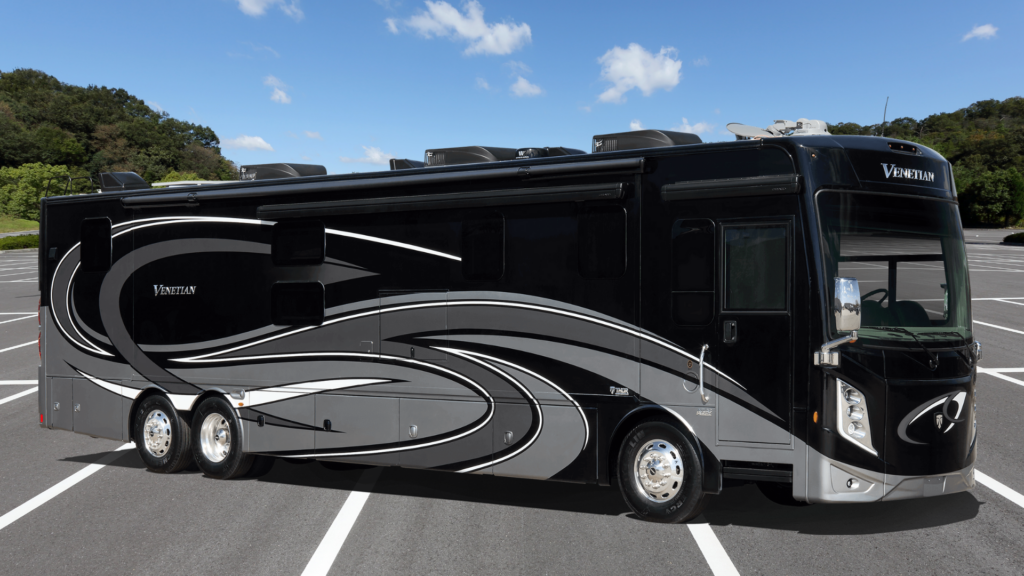 A Thor Venetian Class A Motorhome parked in a parking lot. This could be the best RV for full-time living depending on your style. 