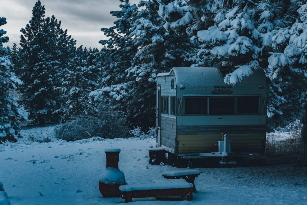 Vintage camper in the snow - how to winterize an RV