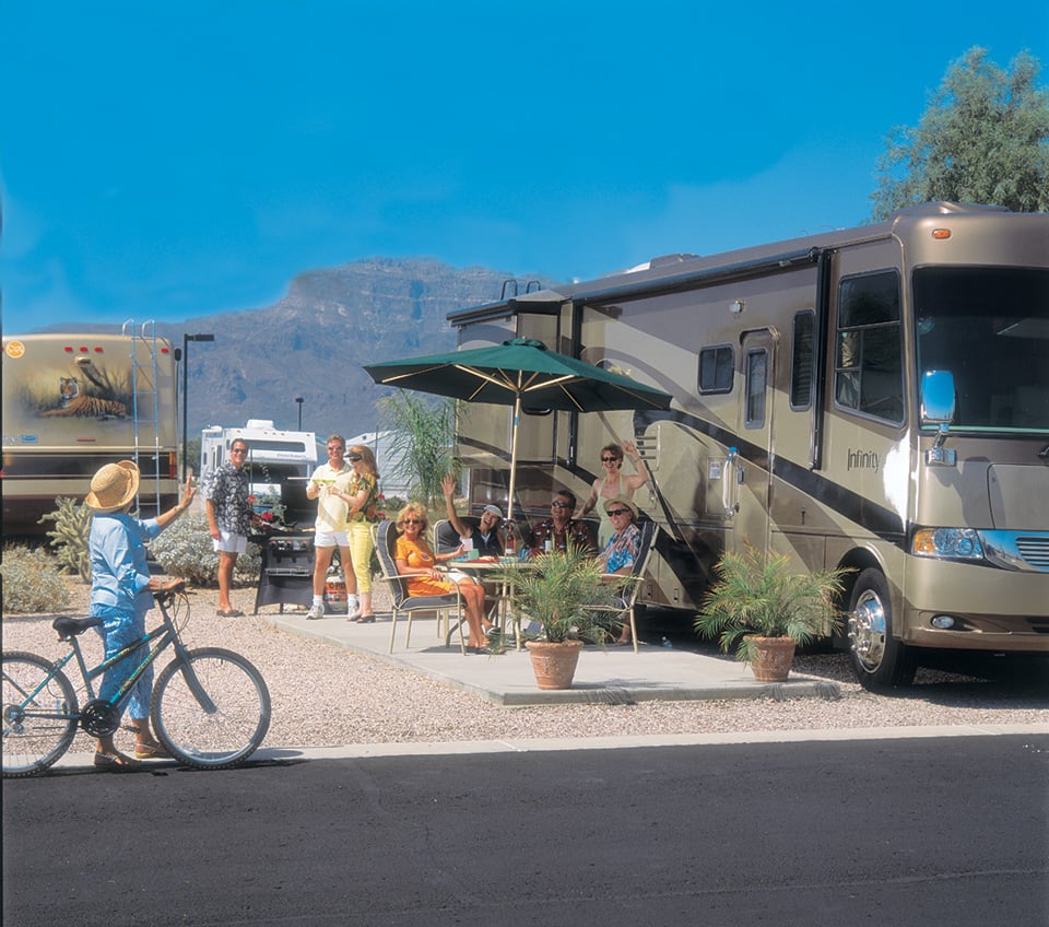 Snowbirds making new friends outside of their RV at Canyon Vistas RV Resort