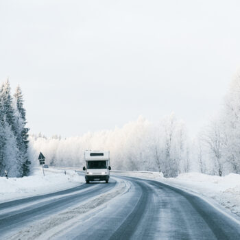 RV on snowy road - looking for winter workkamping jobs