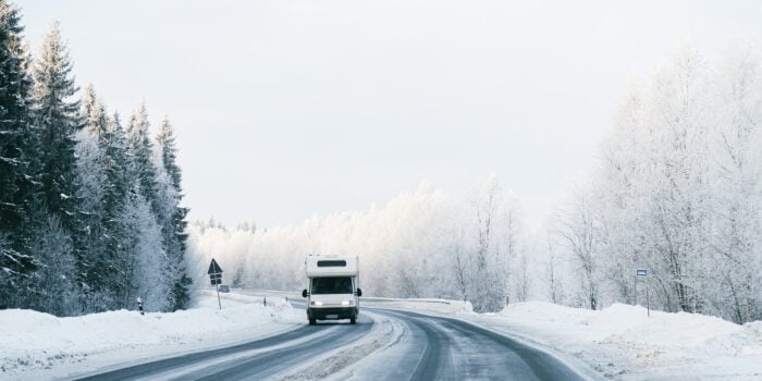 RV on snowy road - looking for winter workkamping jobs