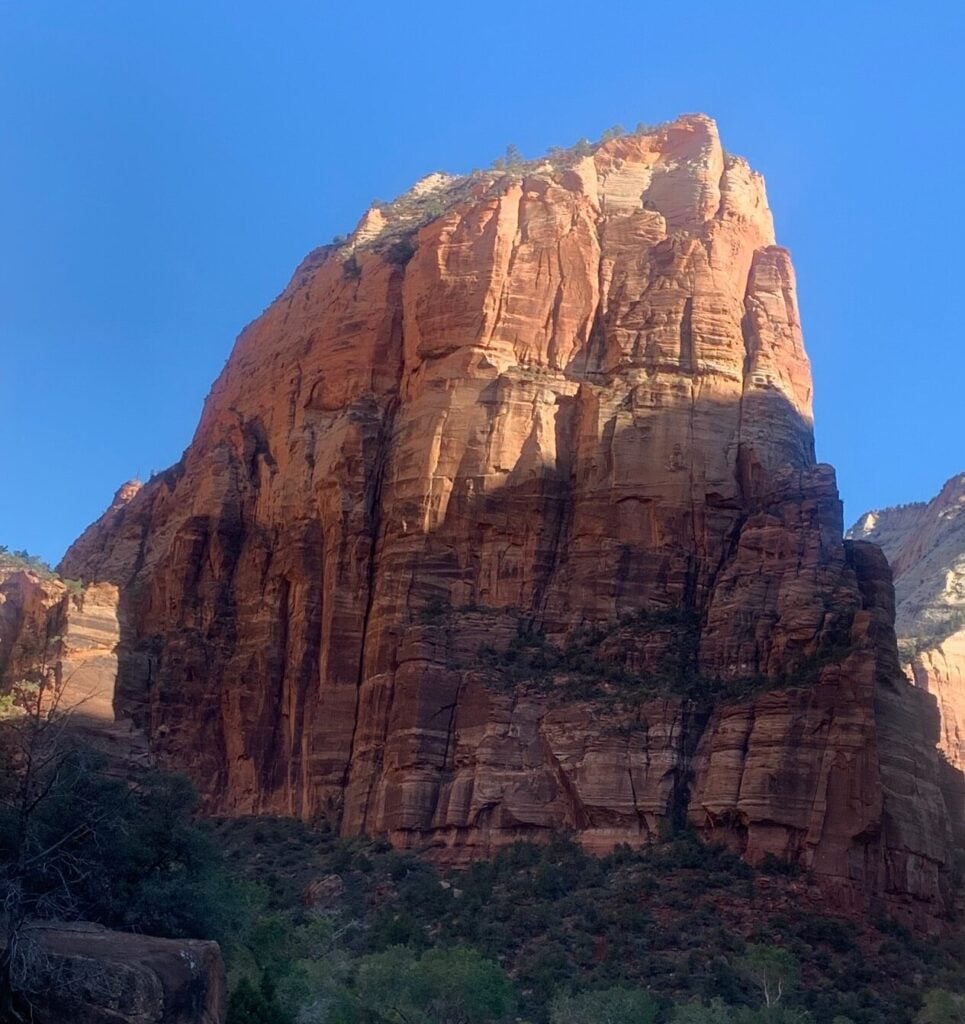 view of angels landing in Zion with sky in background - one of our favorite RV trip ideas