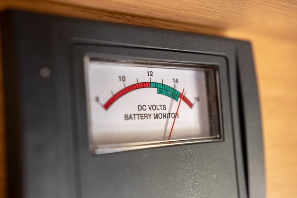 An RV battery monitor that says "DC volts Battery Monitor" 