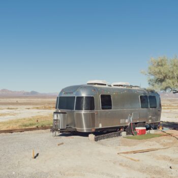 Airstream camping in a desert - feature photo for Where Can You Park Your Camper For Free