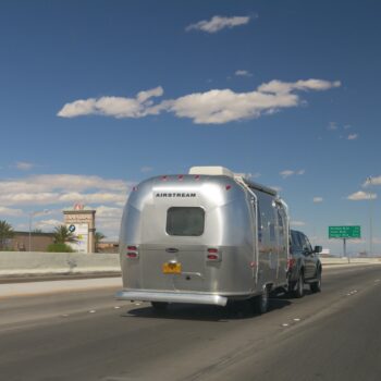 Airstream on interstate - feature image for best RV driving routes