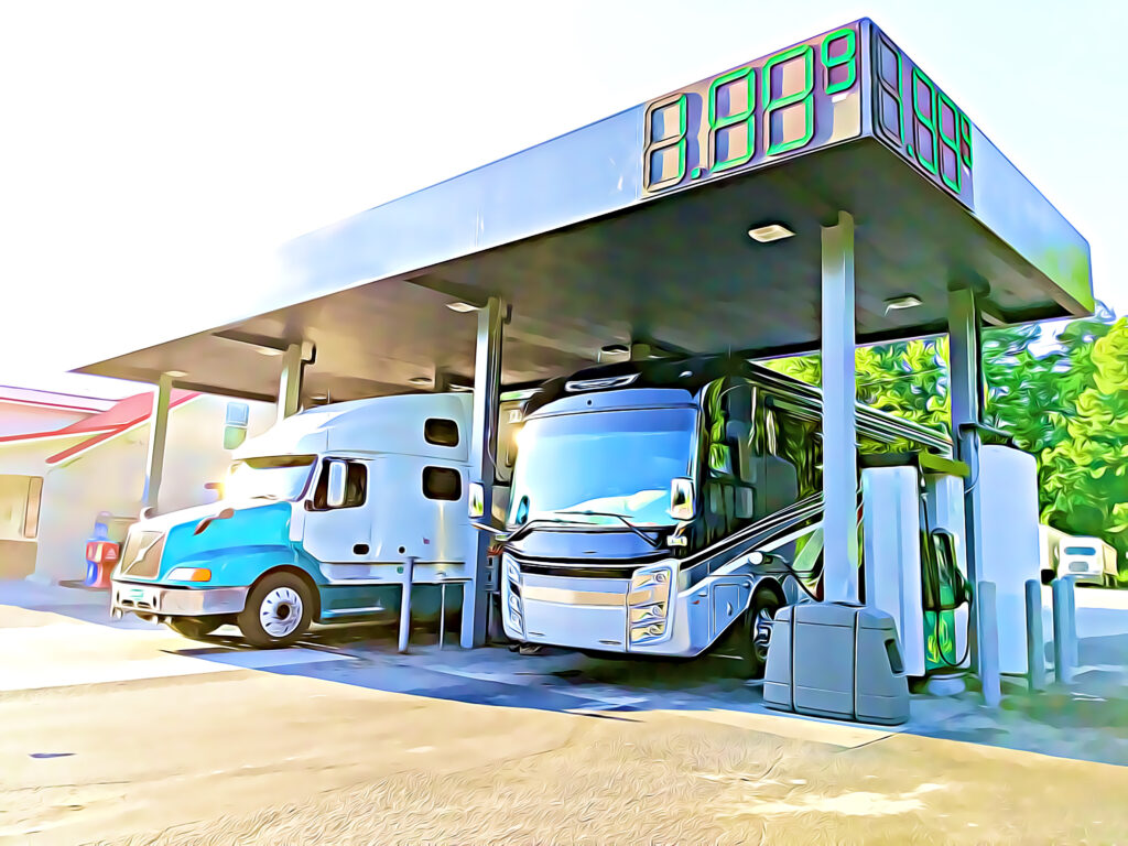 motorhome at gas station with gas prices