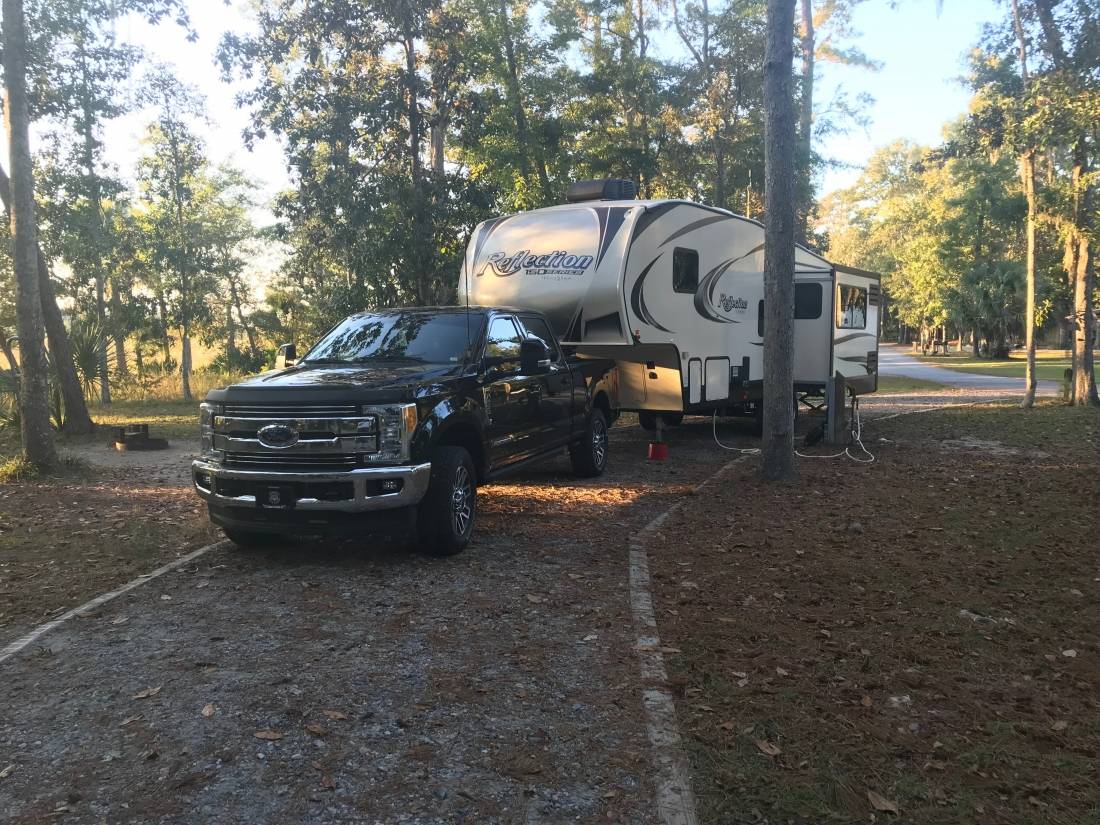 fifth wheel and truck parked in big rig friendly site at Fort McAllister State Park 