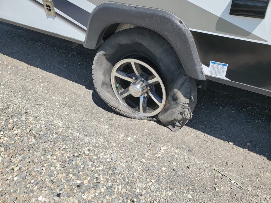 a flat tire on an rv, the result of cheap rv tires
