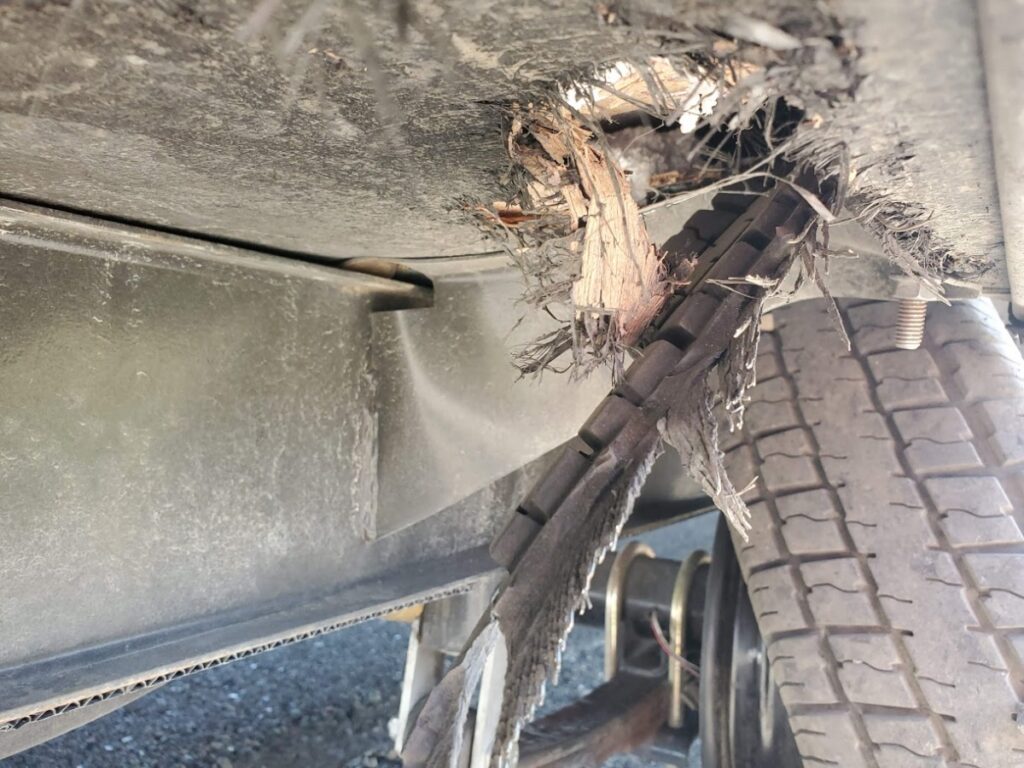 Damage to underside of RV caused by cheap rv tires