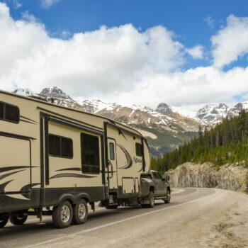 large RV being towed in canada - feature image for What Length RV Should I Buy