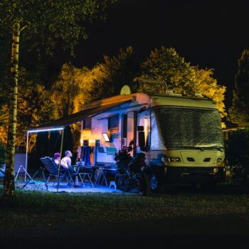 RV at night with lights on inside and RV security system