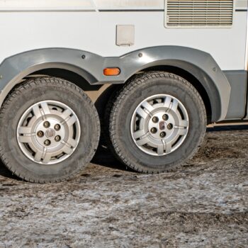 rear wheels on an RV - feature image for replacing tires for an RV