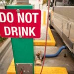"Do Not Drink" sign at RV gray water disposal at dump station