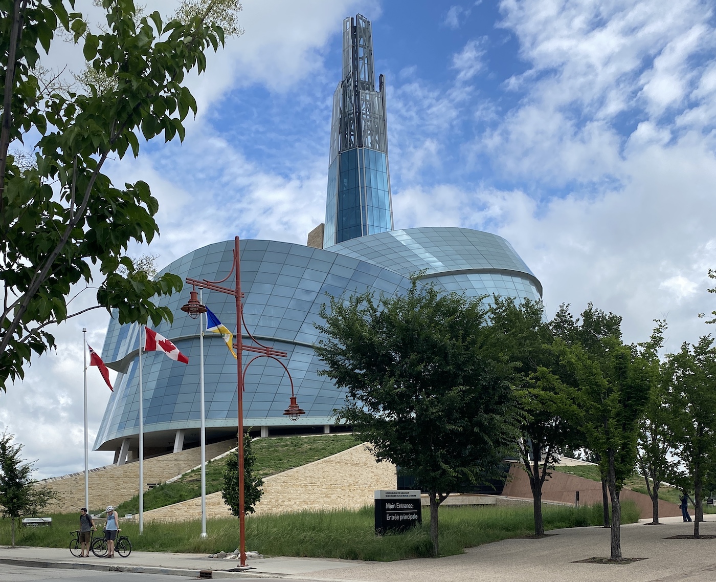 Human rights museum in Winnipeg Manitoba with trees in summer