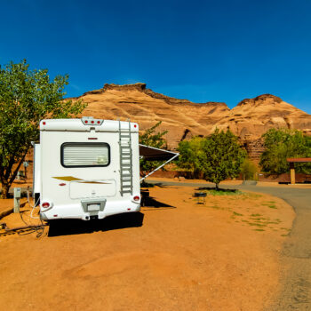 RV in desert campsite - feature image for RV slide out stabilizers