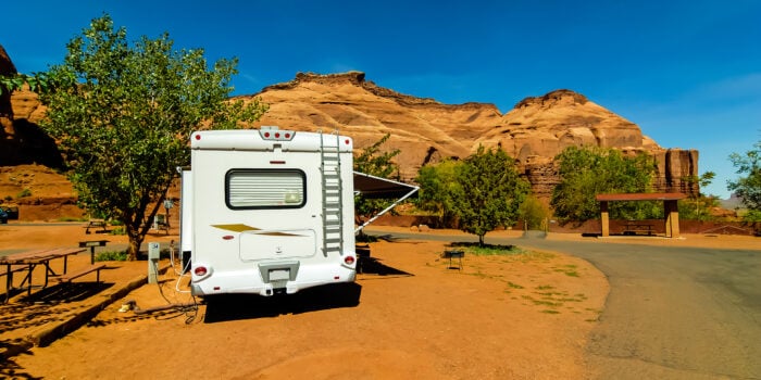 RV in desert campsite - feature image for RV slide out stabilizers