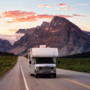 scenic road in Canada with RV - feature image for places to visit before summer ends