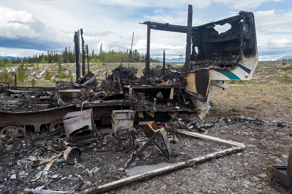 A burned trailer by the side of the road - feature image for fire hazards