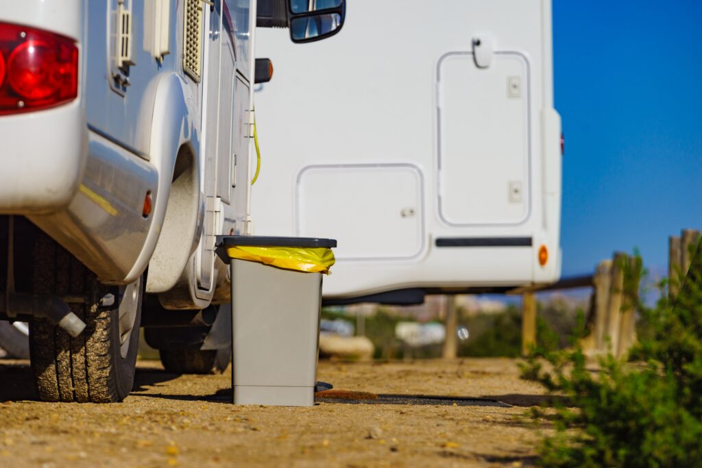 trash can outside of RV - feature image for how to get rid of garbage smell in RV