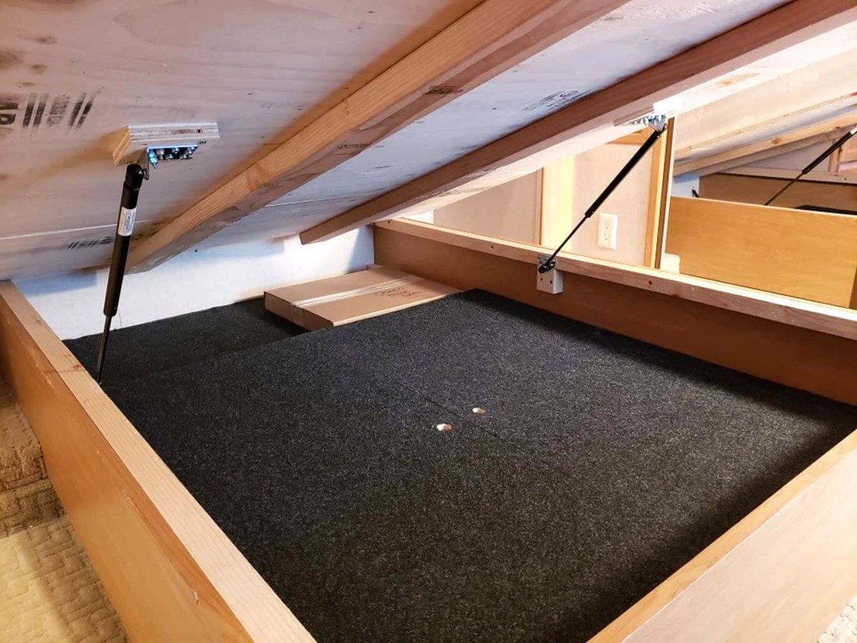 RV bed with hatch and storage space underneath