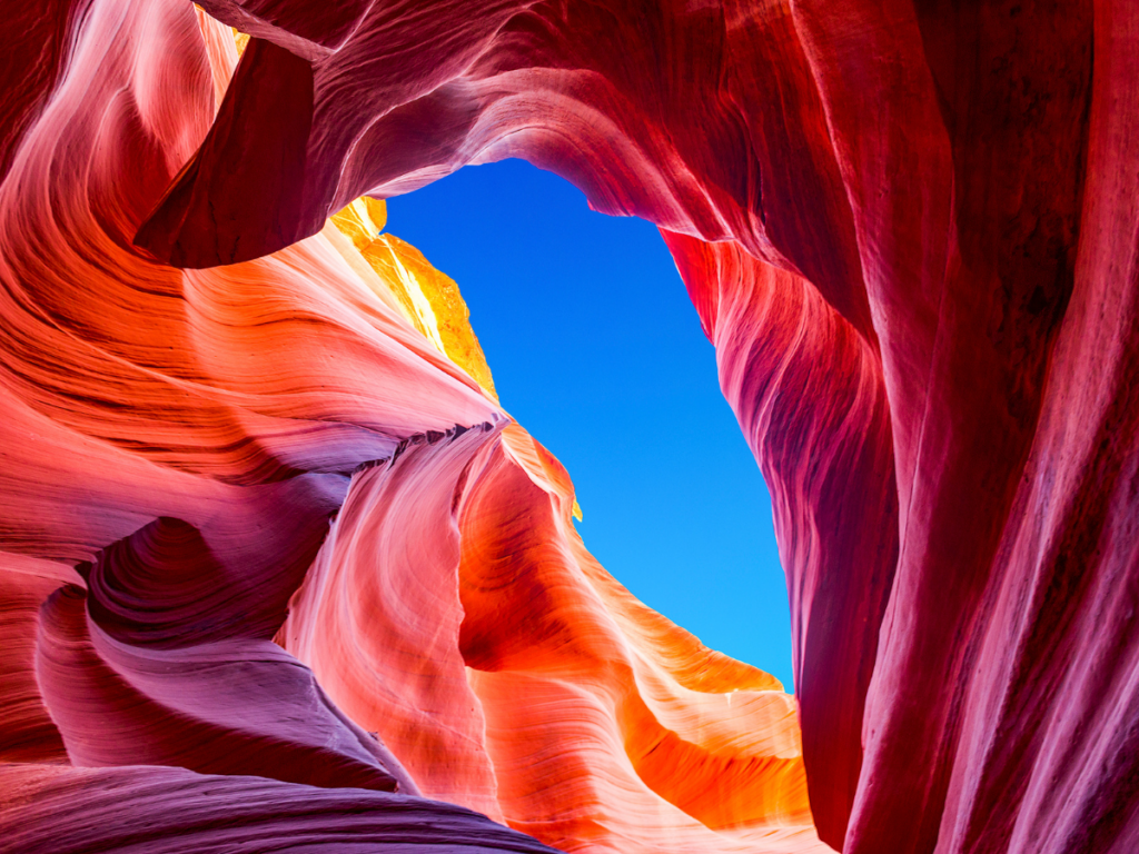 A small view of the sky peeking out from the bottom of Antelope Canyon.