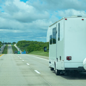 motorhome on highway - feature image for RV brakes article