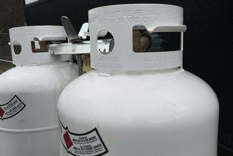 white propane tanks - image for ways to conserve fuel article