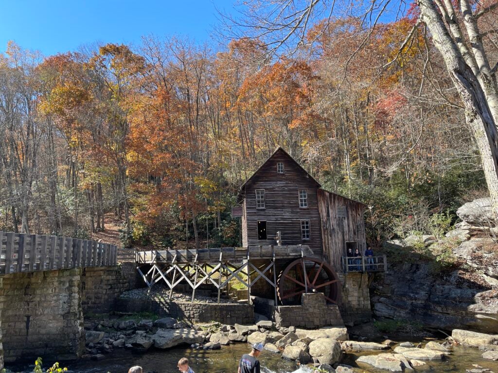 Sightseeing at old mill on river in fall. 
(Image: P. Dent)