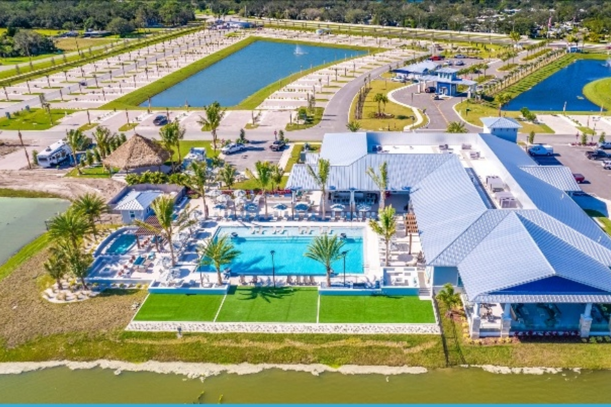 ariel view of Surf Signature RV Resort in Palmetto includinging resort pool club house, lakes and RV pads
