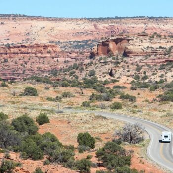 RV on road in US, feature image for RVing lifestyle