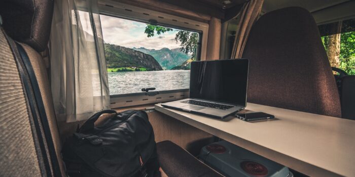 laptop in RV, feature image for open campsites