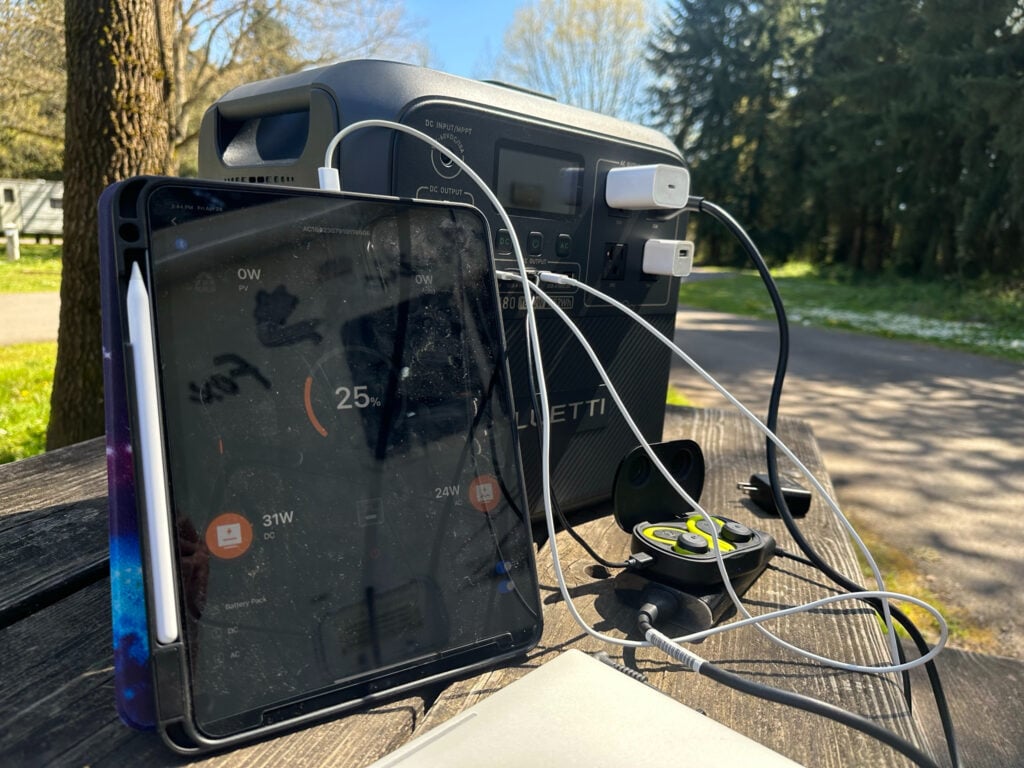 Bluetti AC180 portable power for RVing and camping with electronic devices plugged in