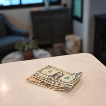 money on counter, image for senior discounts