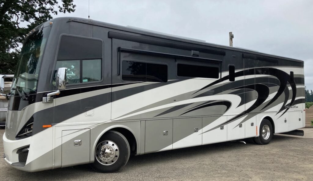 A class A motorhome with the rv slide toppers removed and True Toppers installed.