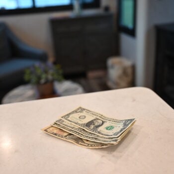 money on counter, image for full time RVing expenses
