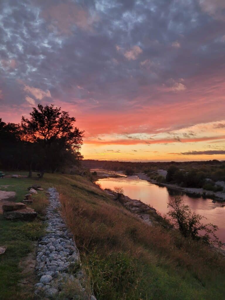 Beautiful sunset on the Llano River. (Image: Dos Rios RV Park)